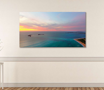 Soft Pastel Colours over Shoalwater Islands Marine Park, WA is an aerial photograph of a stunning sunset along Rockingham's pristine coastline that has a dreamy clamness about it. Available in a selection of canvas sizes. 